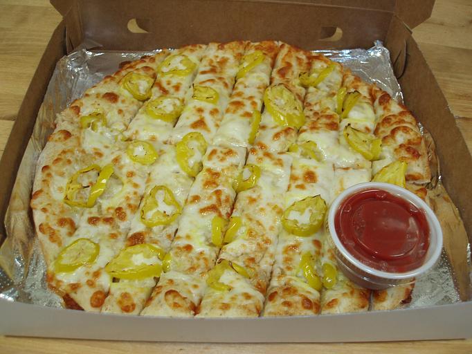 Product: Garlic cheese sticks with banana peppers - Macon Pizza Company in Macon, GA Pizza Restaurant