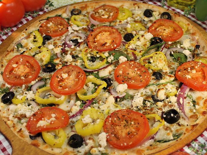 Product: Greek pizza on thin crust - Merlin's Pizza (Destin) in Destin, FL Pizza Restaurant