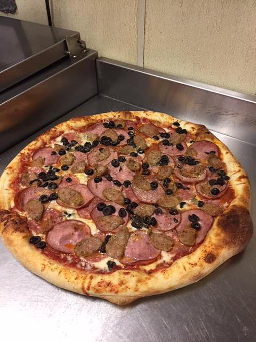 Product - Mezza Luna Pizzeria - Downtown: in Eugene/Springfield, OR Pizza Restaurant Product - Mezza Luna Pizzeria - Downtown: in Eugene/Springfield, OR Pizza Restaurant