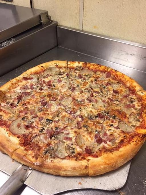 Product - Mezza Luna Pizzeria - Downtown: in Eugene/Springfield, OR Pizza Restaurant Product - Mezza Luna Pizzeria - Downtown: in Eugene/Springfield, OR Pizza Restaurant