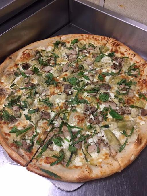 Product - Mezza Luna Pizzeria - Downtown: in Eugene/Springfield, OR Pizza Restaurant Product - Mezza Luna Pizzeria - Downtown: in Eugene/Springfield, OR Pizza Restaurant