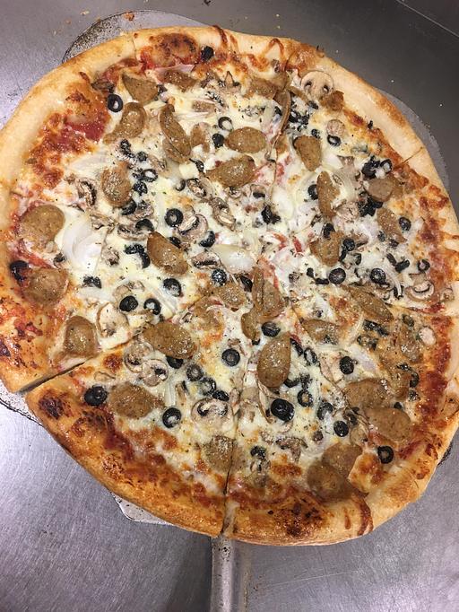 Product - Mezza Luna Pizzeria - Downtown: in Eugene/Springfield, OR Pizza Restaurant Product - Mezza Luna Pizzeria - Downtown: in Eugene/Springfield, OR Pizza Restaurant