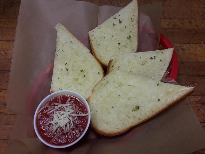 Product: 2 pc Garlic Bread - Mojo Pizza N' Pub in Oakhurst - Decatur, GA Pizza Restaurant Product: 2 pc Garlic Bread - Mojo Pizza N' Pub in Oakhurst - Decatur, GA Pizza Restaurant