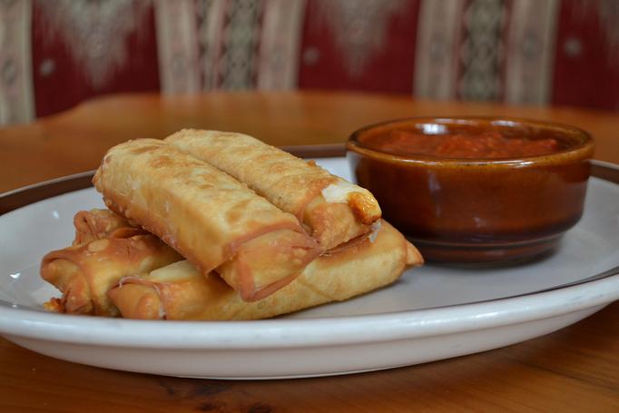 Product: Hand rolled at Moosejaw, a classic! - Moosejaw Pizza in The Waterpark Capital of the World in Wisconsin Dells! - Wisconsin Dells, WI American Restaurants