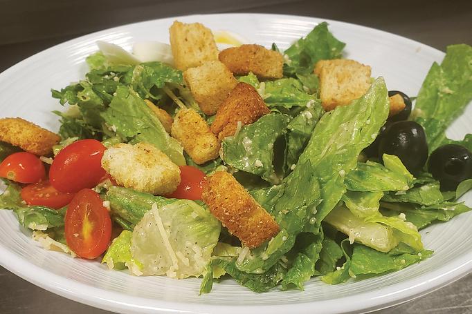 Product: A classic Caesar Salad! - Moosejaw Pizza in The Waterpark Capital of the World in Wisconsin Dells! - Wisconsin Dells, WI American Restaurants