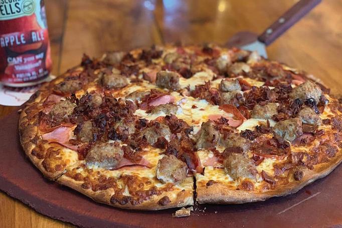 Product: The local's favorite, BBQ Pizza! - Moosejaw Pizza in The Waterpark Capital of the World in Wisconsin Dells! - Wisconsin Dells, WI American Restaurants