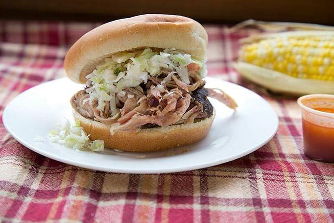 Product: You just can't beat a Pulled Pork Sandwich from New Market BBQ! At least that's what our customers tell us all the time. We sometimes sell out, so be sure to come on out and see us before the day gets too long, or you just might miss out! - New Market BBQ in Downtown New Market, AL - New Market, AL Barbecue Restaurants