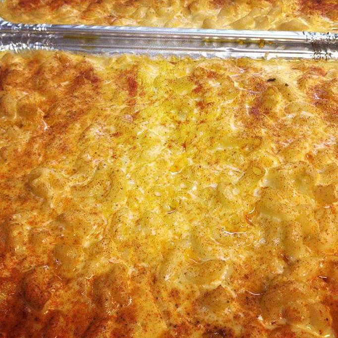 Product: Our Smoked Mac n' Cheese can be a side on any of our plates, family packs, or just add it on to round out your meal. Great stuff that all your family will enjoy. IF you happen to have any left overs, it does reheat well. - New Market BBQ in Downtown New Market, AL - New Market, AL Barbecue Restaurants