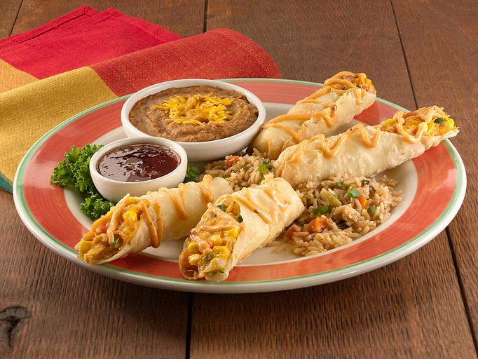 Product: Hand-rolled flour tortillas filled with seasoned shredded chicken, roasted red and poblano peppers, grilled corn with mild Cheddar and Monterey Jack cheese. Served with our jalapeño jelly sauce for dipping. Includes Spanish rice and your choice of beans. - Paradiso Mexican Restaurant in Fargo, ND Mexican Restaurants
