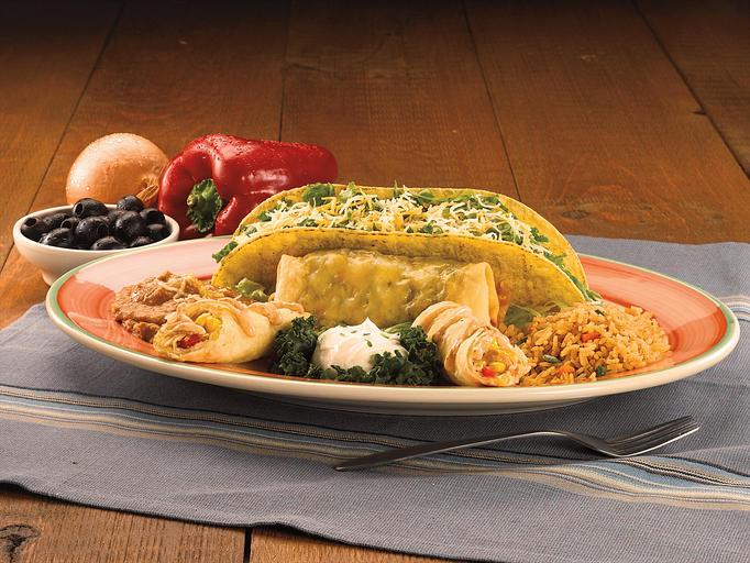 Product: This one put us on the map! Lightly crisped flautas, a special chimi and our famous taco. Served with Spanish rice, your choice of beans, diced tomatoes and sour cream topping. - Paradiso Mexican Restaurant in Fargo, ND Mexican Restaurants