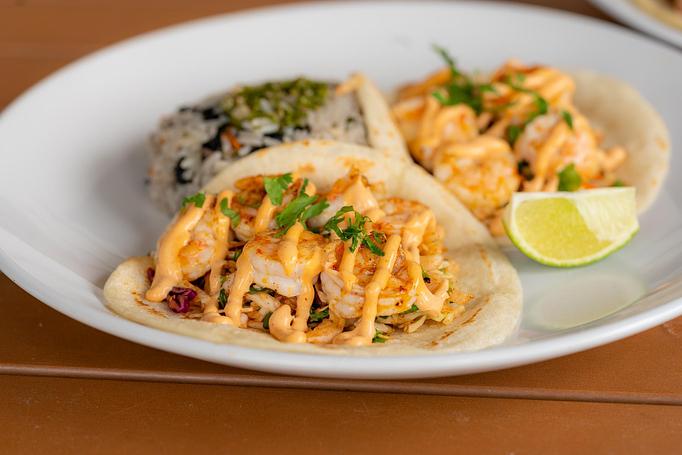 Product: Grilled shrimp, cabbage slaw, chipotle aioli, Mercado flour tortillas. - Red Mesa Restaurant in St Petersburg, FL Mexican Restaurants Product: Grilled shrimp, cabbage slaw, chipotle aioli, Mercado flour tortillas. - Red Mesa Restaurant in St Petersburg, FL Mexican Restaurants
