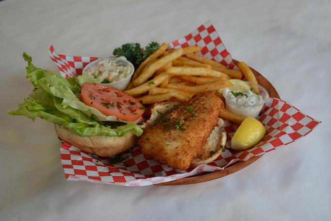 Product: Tuesday | Fried Fish Sandwich. - Rustic Inn Crabhouse in Fort Lauderdale, FL Seafood Restaurants