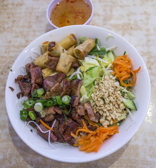 Product: Grilled Hanoi Pork & crispy spring roll - Saigon Saigon in Pentagon City - Arlington, VA Vietnamese Restaurants Product: Grilled Hanoi Pork & crispy spring roll - Saigon Saigon in Pentagon City - Arlington, VA Vietnamese Restaurants