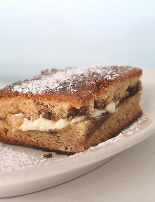 Product: cinnamon-walnut-sour cream coffee cake layered with cream cheese then grilled - Southport Grocery & Cafe in Lakeview - Chicago, IL American Restaurants