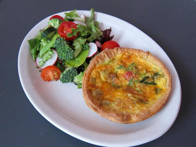 Product: from-scratch veggie quiche with a mixed green salad - Southport Grocery & Cafe in Lakeview - Chicago, IL American Restaurants
