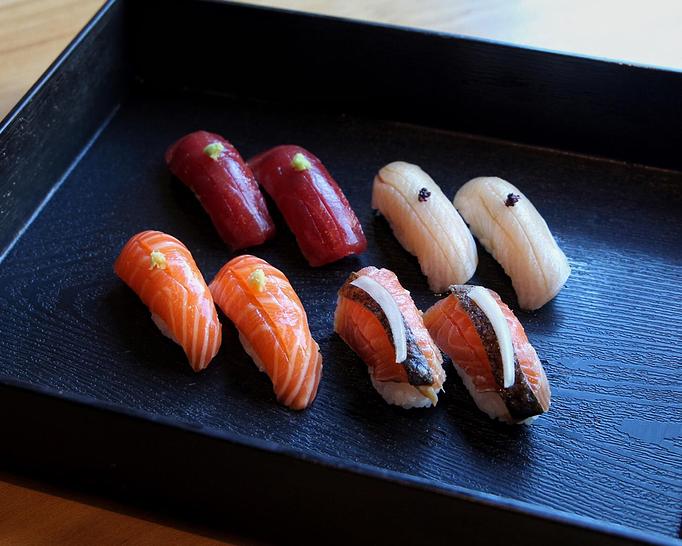 Product: features 2 pieces each: akami (lean tuna loin), hamachi (yellowtail), faroe island salmon, and a zuke preparation of the same faroe island salmon where the whole salmon side is torched and allowed to marinate in savory soy for over 24 hours - Sushi San - Reservations in River North - Chicago, IL Japanese Restaurants