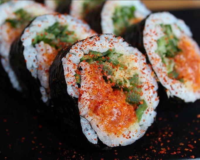 Product: faroe island salmon mixed with yuzu and spicy korean gochujang is rolled with cucumber, jalapeño, chives, and a bit of tempura crunch. served with side of wasabi soy. - Sushi San - Reservations in River North - Chicago, IL Japanese Restaurants