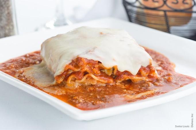 Product: Layers of pasta filled with Ricotta cheese and Italian meat sauce. - Swiss Louis in San Francisco, CA Restaurants/Food & Dining