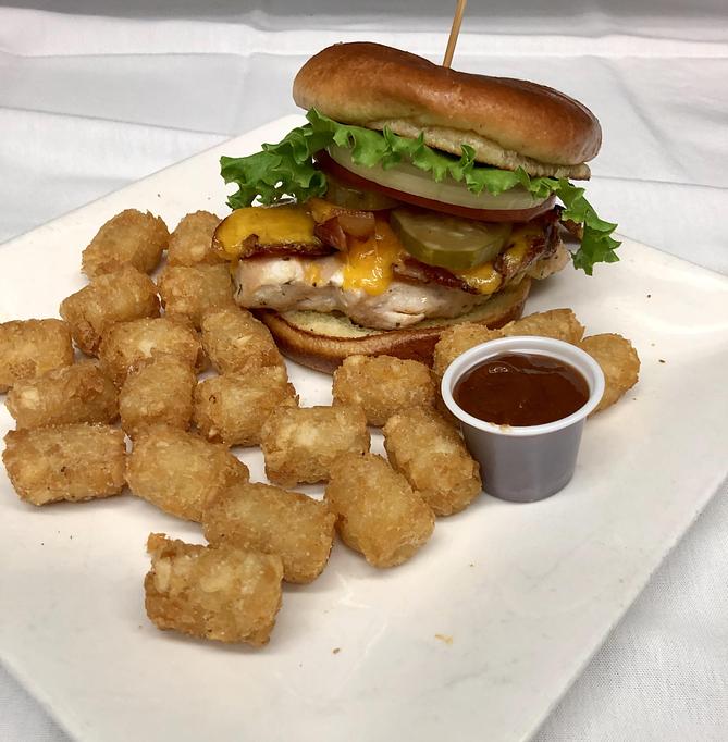 Product: Served with choice of tater tots or fries. - The Bottom Line in Farragut Square, Downtown - Washington, DC Pubs Product: Served with choice of tater tots or fries. - The Bottom Line in Farragut Square, Downtown - Washington, DC Pubs