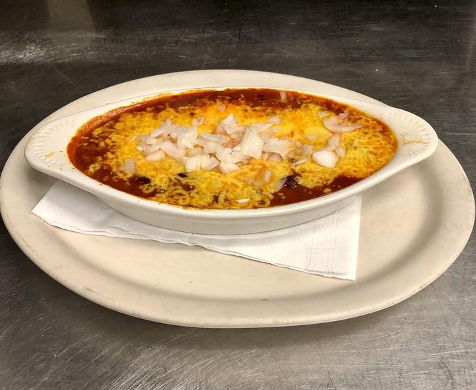 Product: Bowl of Chili topped with cheddar cheese and chopped onion. - The Bottom Line in Farragut Square, Downtown - Washington, DC Pubs