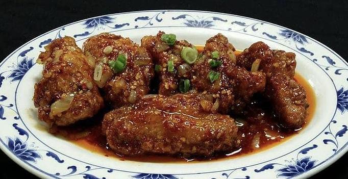 Product: Spicy hot wings - Tsing Tsao Chinese Fast Food in Des Moines, IA Chinese Restaurants