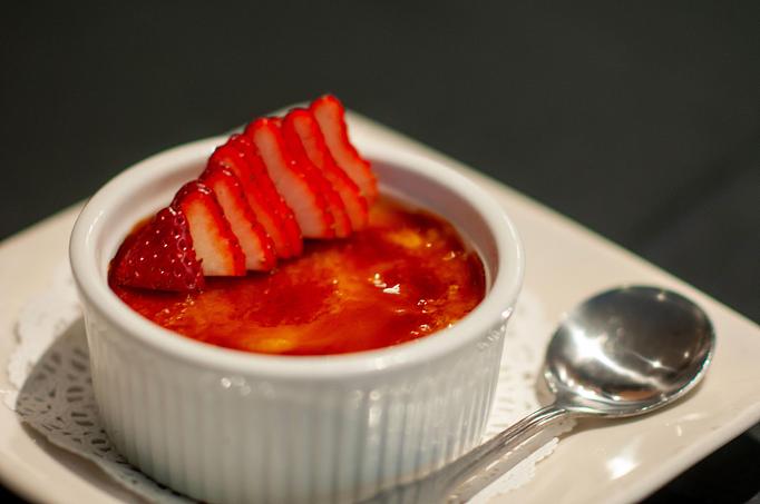 Product: Classic vanilla bean creme brulee. - Midtown Cafe in Nashville, TN American Restaurants Product: Classic vanilla bean creme brulee. - Midtown Cafe in Nashville, TN American Restaurants