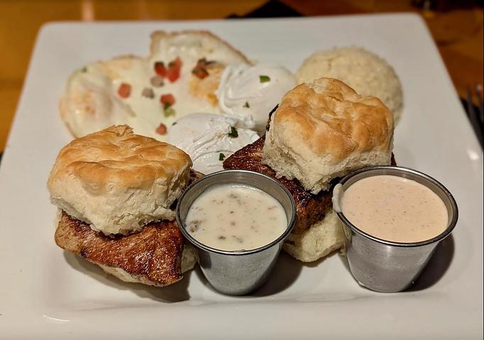 Product: Two biscuits w/ mild BBQ dry rub roasted pork tenderloin
Served w/ two eggs any way and sides of Alabama white sauce & country sausage gravy - Midtown Cafe in Nashville, TN American Restaurants Product: Two biscuits w/ mild BBQ dry rub roasted pork tenderloin
Served w/ two eggs any way and sides of Alabama white sauce & country sausage gravy - Midtown Cafe in Nashville, TN American Restaurants