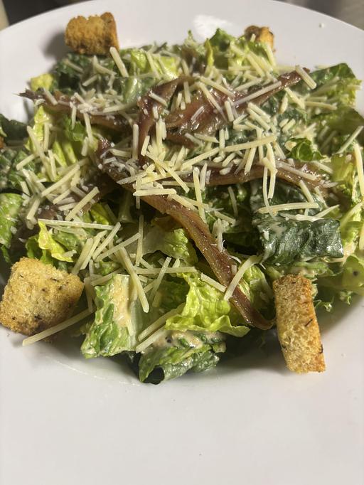 Product: Crisp romaine lettuce tossed in our Caesar dressing,
topped with house-made croutons and Parmesan cheese. Anchovies added upon request! - Midtown Cafe in Nashville, TN American Restaurants Product: Crisp romaine lettuce tossed in our Caesar dressing,
topped with house-made croutons and Parmesan cheese. Anchovies added upon request! - Midtown Cafe in Nashville, TN American Restaurants