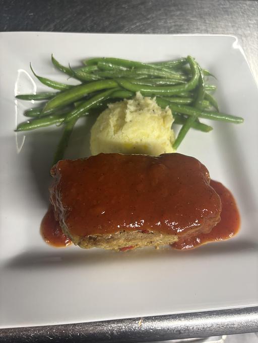 Product: 10oz served with tomato herb gravy,
Yukon gold mashed potatoes, and French greens beans. - Midtown Cafe in Nashville, TN American Restaurants Product: 10oz served with tomato herb gravy,
Yukon gold mashed potatoes, and French greens beans. - Midtown Cafe in Nashville, TN American Restaurants