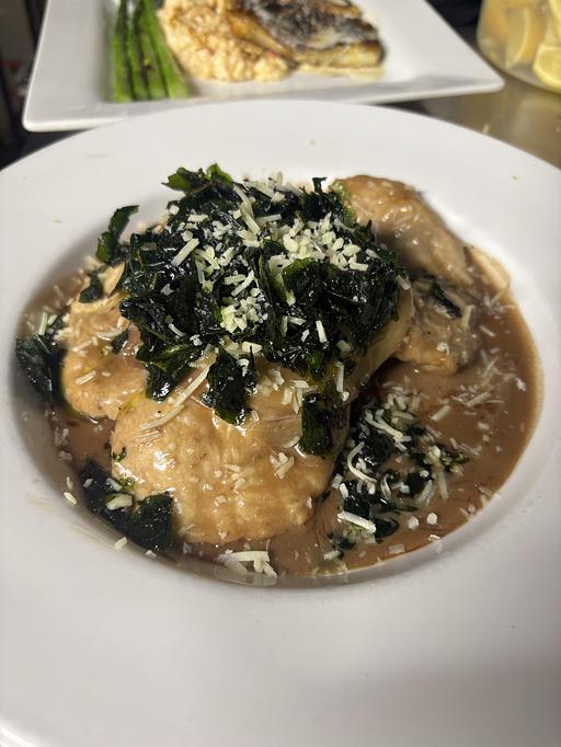 Product: 8oz breast layered with Benton’s Tennessee ham, provolone cheese,
Parmesan cheese, over a bed of Yukon mashed potatoes and fried spinach with red wine glaze. - Midtown Cafe in Nashville, TN American Restaurants Product: 8oz breast layered with Benton’s Tennessee ham, provolone cheese,
Parmesan cheese, over a bed of Yukon mashed potatoes and fried spinach with red wine glaze. - Midtown Cafe in Nashville, TN American Restaurants