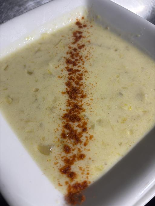 Product: Artichokes and lemons blended in a creamy chicken broth. - Midtown Cafe in Nashville, TN American Restaurants Product: Artichokes and lemons blended in a creamy chicken broth. - Midtown Cafe in Nashville, TN American Restaurants