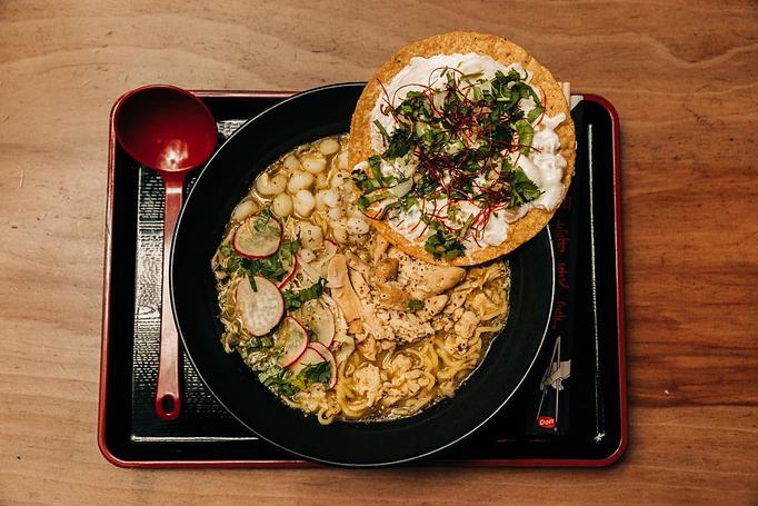 Product: our version of the traditional Mexican dish. our classic chicken broth with a salsa verde topped with poached chicken, white hominy, cabbage mix and a creamy tostada. - RAMEN-SAN Whisky Bar in Fulton Market - Chicago, IL Japanese Restaurants