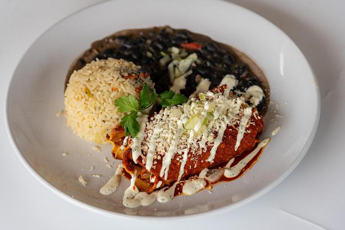 Product: Chile guajillo, queso fresco, cilantro-onion, crema. Cilantro rice & black beans. - Red Mesa Restaurant in St Petersburg, FL Mexican Restaurants Product: Chile guajillo, queso fresco, cilantro-onion, crema. Cilantro rice & black beans. - Red Mesa Restaurant in St Petersburg, FL Mexican Restaurants