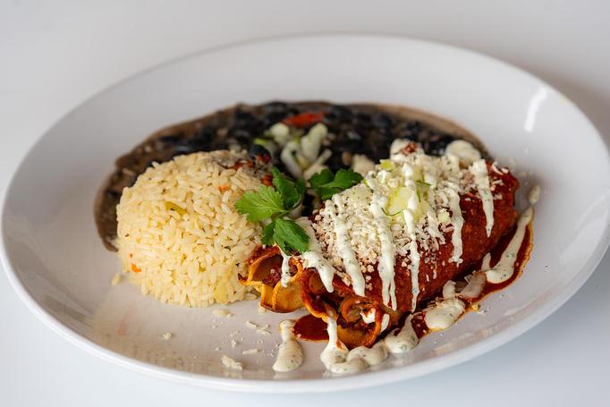 Product: Oaxaca and jack cheese, salsa roja, queso fresco, cilantro-onion, crema. Cilantro rice & black beans. - Red Mesa Restaurant in St Petersburg, FL Mexican Restaurants Product: Oaxaca and jack cheese, salsa roja, queso fresco, cilantro-onion, crema. Cilantro rice & black beans. - Red Mesa Restaurant in St Petersburg, FL Mexican Restaurants
