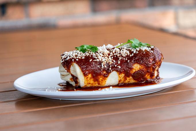 Product: Sausage, bacon, scrambled eggs, potatoes, poblano peppers and onions, pico de gallo, Monterey Jack cheese, salsa roja, queso fresco and cilantro. - Red Mesa Restaurant in St Petersburg, FL Mexican Restaurants Product: Sausage, bacon, scrambled eggs, potatoes, poblano peppers and onions, pico de gallo, Monterey Jack cheese, salsa roja, queso fresco and cilantro. - Red Mesa Restaurant in St Petersburg, FL Mexican Restaurants