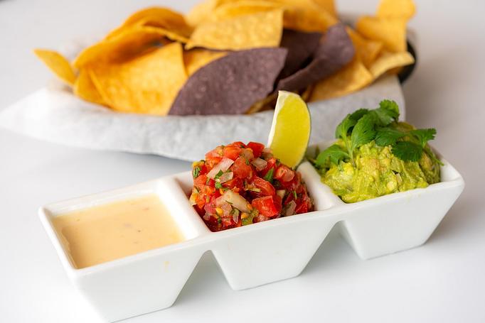 Product: Queso blanco, guacamole, pico de gallo. Chips. - Red Mesa Restaurant in St Petersburg, FL Mexican Restaurants