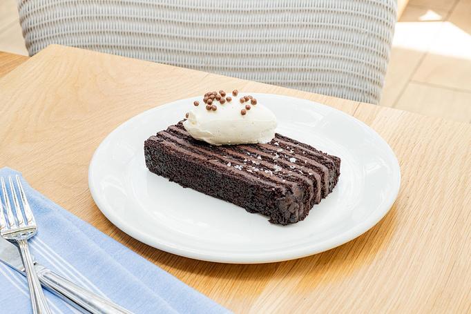 Product: Chocolate cake layered with chocolate ganache and dark chocolate mousse - Summer House - Las Vegas in Las Vegas, NV Restaurants/Food & Dining