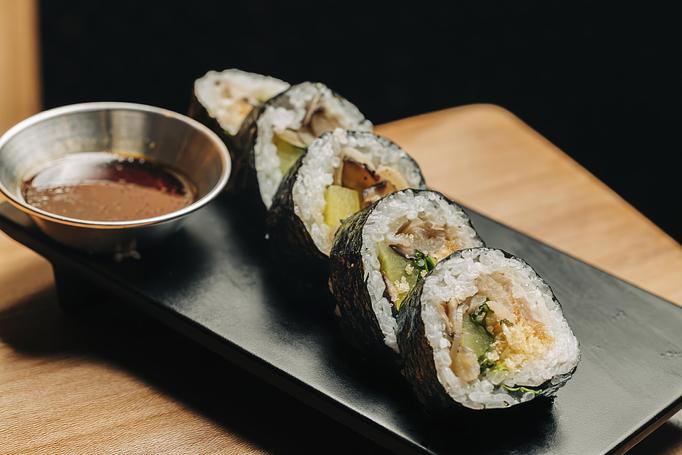 Product: layers of flavor and texture will make you say "umami!" roasted mushrooms and sweet onion are dressed with truffle mayo and rolled with pickled daikon, tempura crunch, daikon sprouts, ohba, and sesame seeds. available in 5 or 10 pieces - Sushi San - Reservations in River North - Chicago, IL Japanese Restaurants