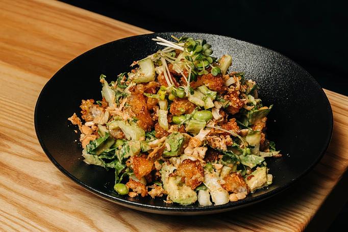 Product: "croutons" made from our fan-favorite crispy rice are the finishing touch on a salad made from baby bok choy, edamame, daikon sprouts, chopped roasted cashews, and finished with a sweet and savory cashew vinaigrette - Sushi San - Reservations in River North - Chicago, IL Japanese Restaurants