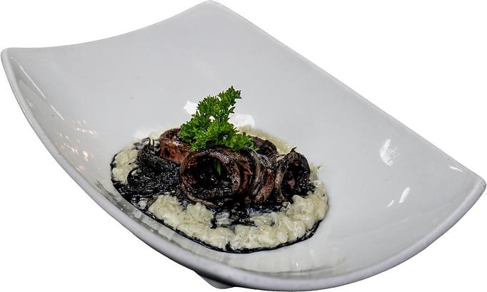 Product: TXIPIRONES EN SU TINTA CON ARROZ - Taberna del Alabardero in Washington, DC Spanish Restaurants