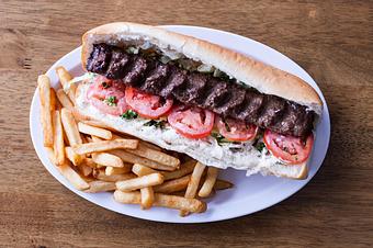 Product: Beef koobideh (ground) sandwich made with, mayo, parsley, onion, tomato, lettuce on your choice of bread, French roll or lavash wrap (thin bread) - Aiden's Grill in la crescenta / montrose / sunlandtujunga  /goendale - Glendale, CA Mediterranean Restaurants