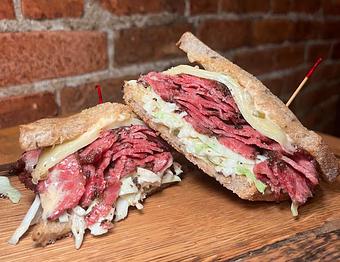 Product: Pastrami Reuben - Ashley's Restaurant in Across from the University of Michigan Campus in the heart fo the State Street Shopping District. - Ann Arbor, MI American Restaurants