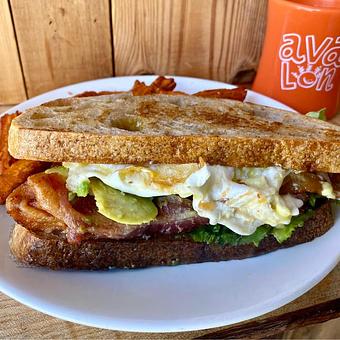 Product: Fried Egg, Avocado & Bacon Sandwich - Avalon International Breads in Cass Corridor/Midtown - Detroit, MI Bakeries