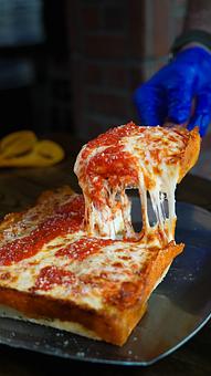 Product: Gluten-Friendly Detroit Style Pizza - cheese pull - Blue Pan Pizza in West Higlands - Denver, CO Dessert Restaurants