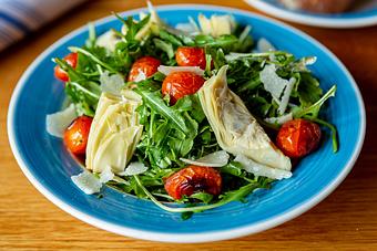 Product: Arugula and Artichoke Salad - Blue Pan Pizza in South Golden - Golden, CO American Restaurants