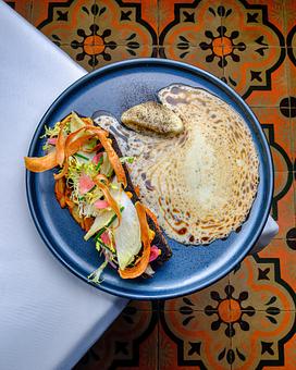 Product: Blackened Redfish

Louisiana Blue Crab And Plantain A La Creole, Young Chicories, Smoked Garlic - Brennan's - Wine Cellar in French Quarter - New Orleans, LA Cajun & Creole Restaurant