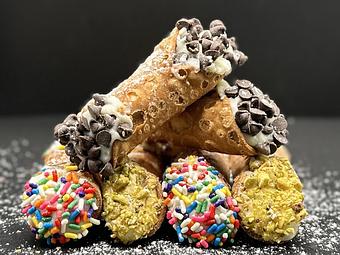 Product: Indulge in the trio of crushed pistachios, mini chocolate chips, and rainbow sprinkles,
crafted to offer a delightful journey into Italian sweetness. - Brown Dog Pizza in Downtown Telluride, Main Street - Telluride, CO Bars & Grills