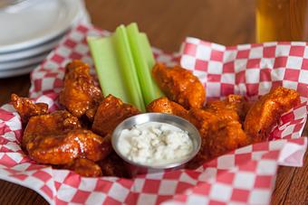 Product: Boneless Wings. Hot (6), Sweet BBQ (6) - Brown Dog Pizza in Downtown Telluride, Main Street - Telluride, CO Bars & Grills