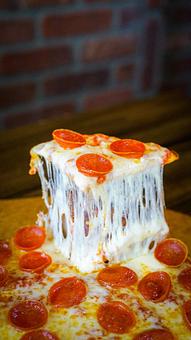 Product: Cupping Pepperoni - Thin Cut (Bold) - Brown Dog Pizza in Downtown Telluride, Main Street - Telluride, CO Bars & Grills