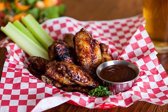 Product: Caribbean Jerk Wings (Bone-In Only) - Brown Dog Pizza in Downtown Telluride, Main Street - Telluride, CO Bars & Grills